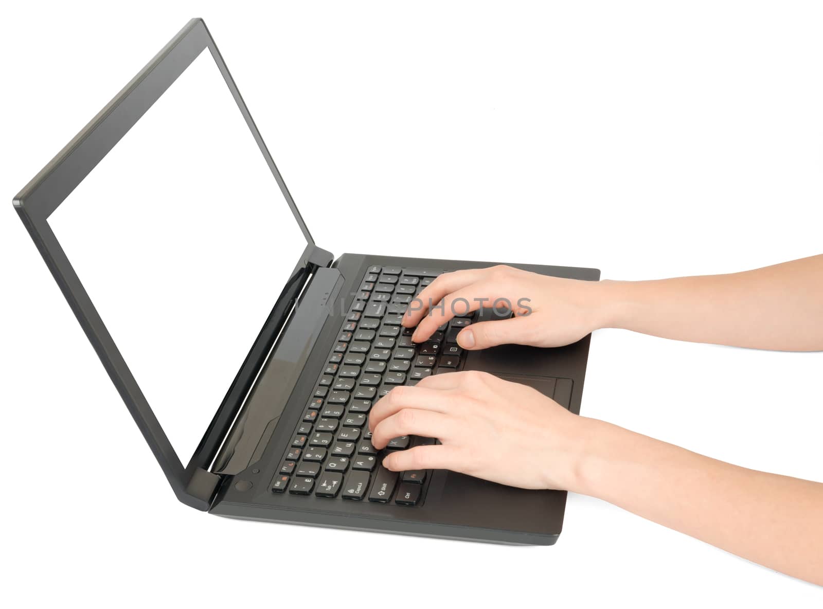 Female hands using laptop on isolated white background, closeup