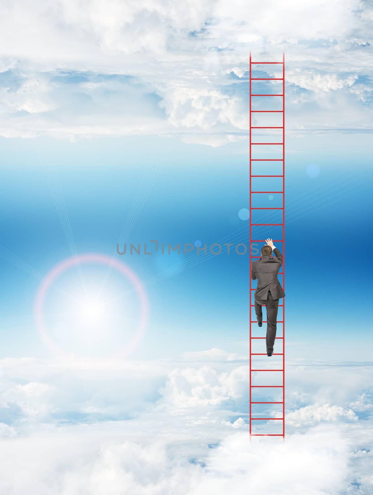 Businessman climbing up ladder in cloudy sky