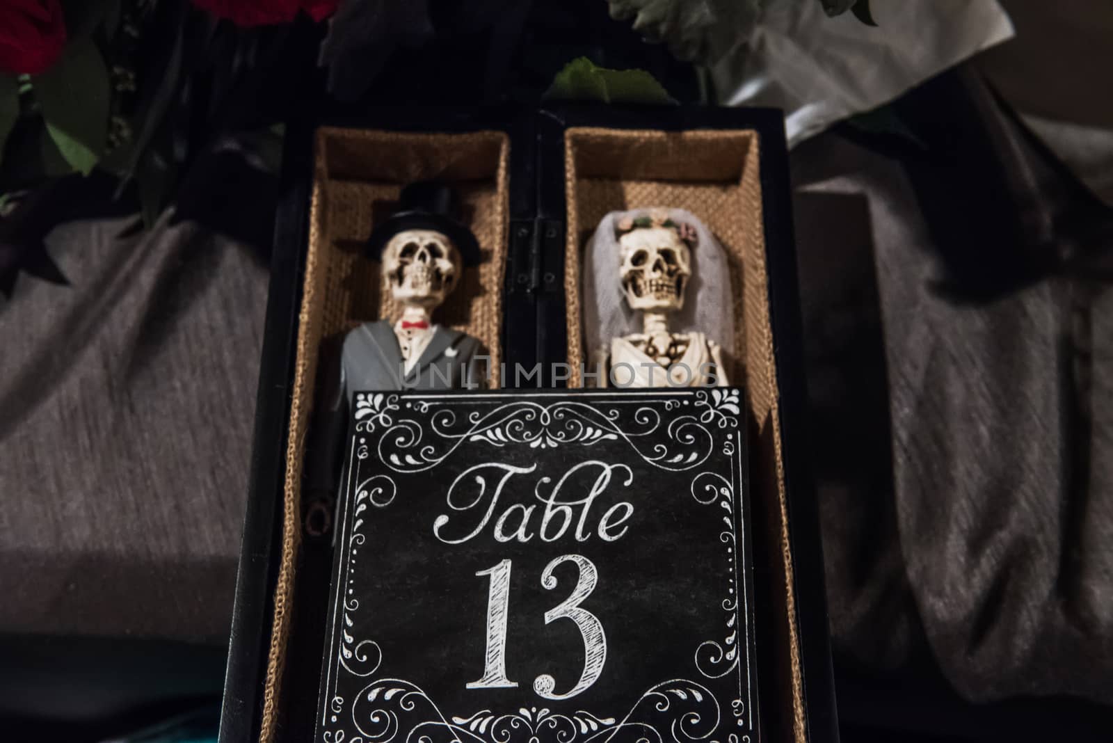 Image of table number 13 featuring day of the dead figures