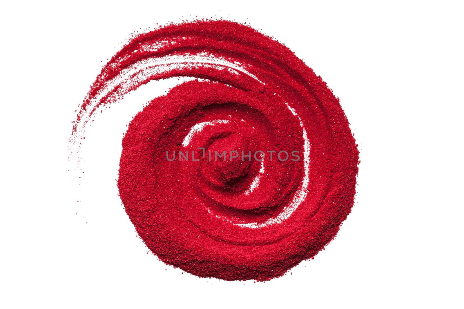 Top view close up of red color spiral made of soil on white background.