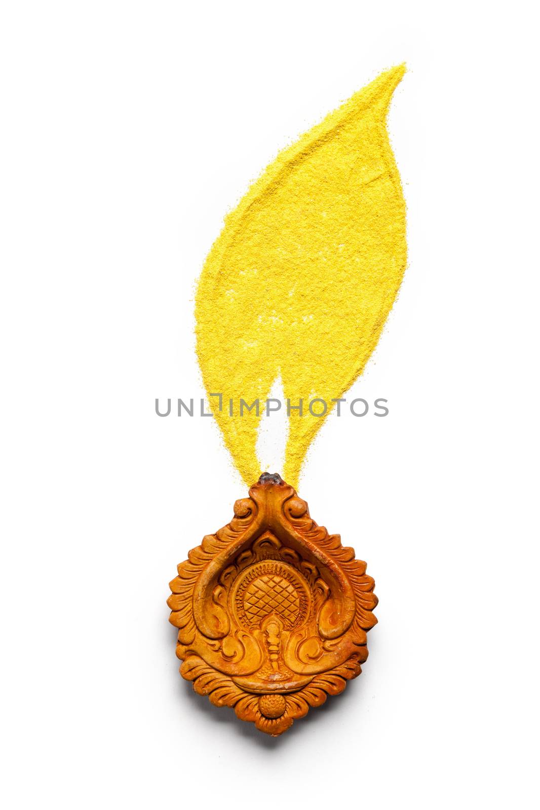 Creative design of burning diwali diya made of handmade soil colors isolated on white background.