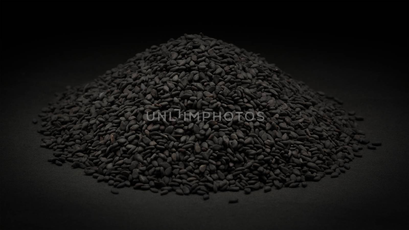 Pile of Organic Black Sesame (Sesamum indicum) by ziprashantzi