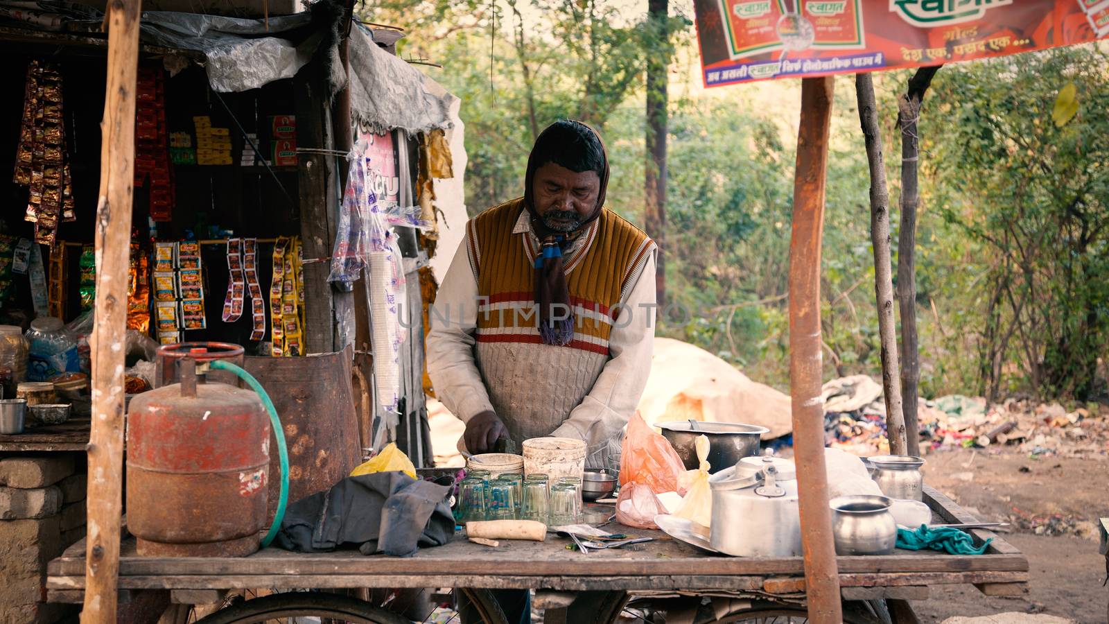 A Local street tea vendor preparing tea. by ziprashantzi