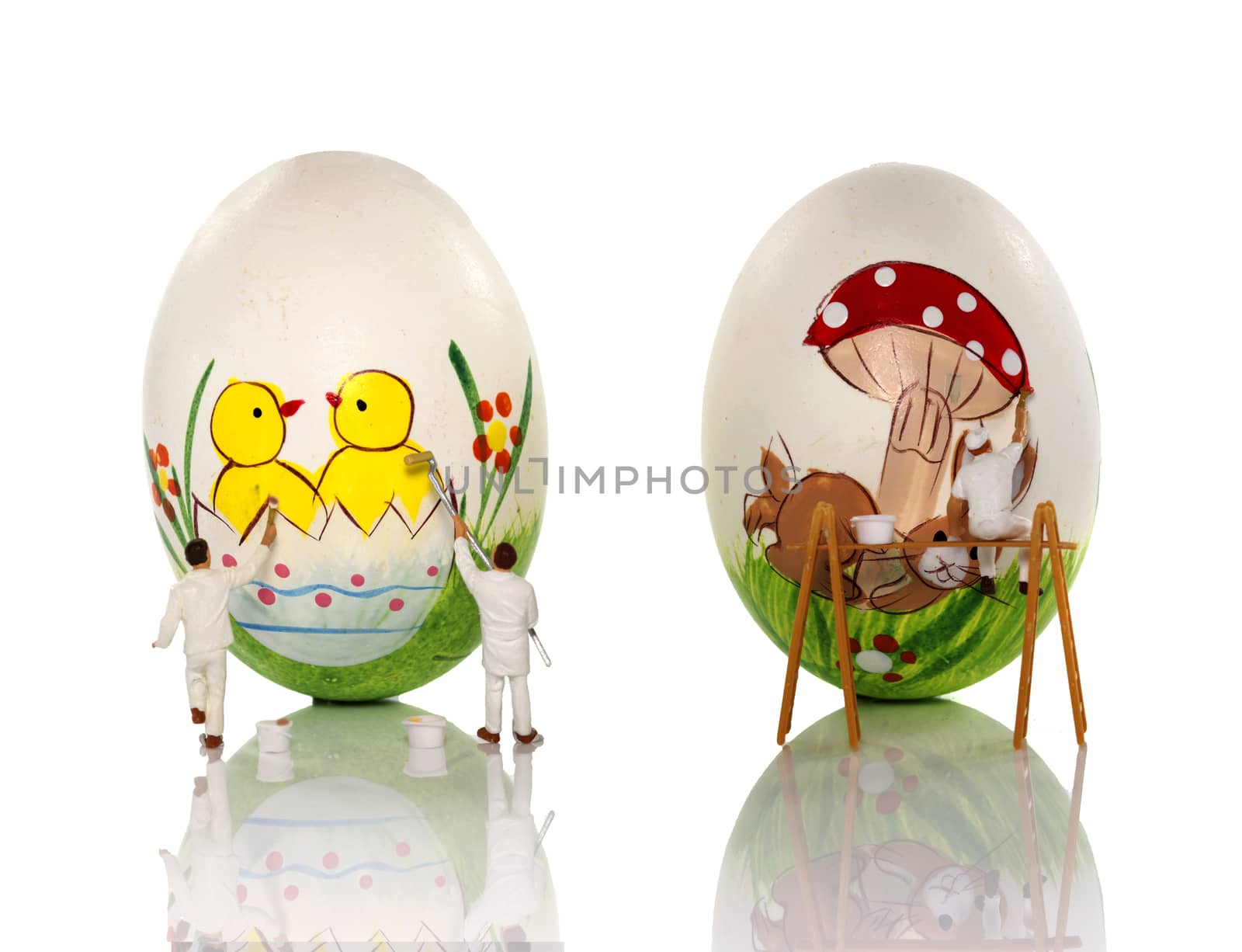 little world painting the eggs for easter