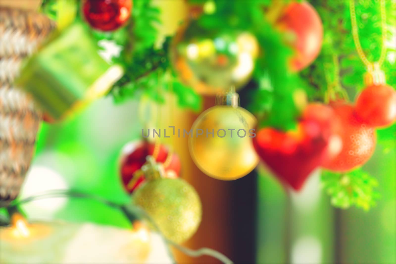 bokeh Christmas balls and Christmas tree with light background