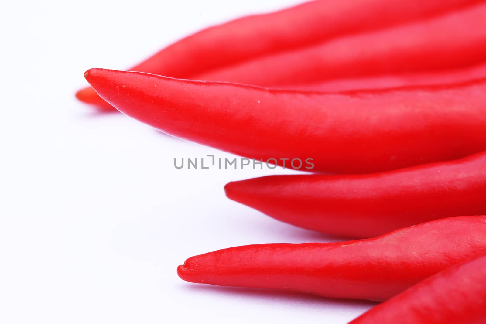 Macro view of a red pepper on white background 