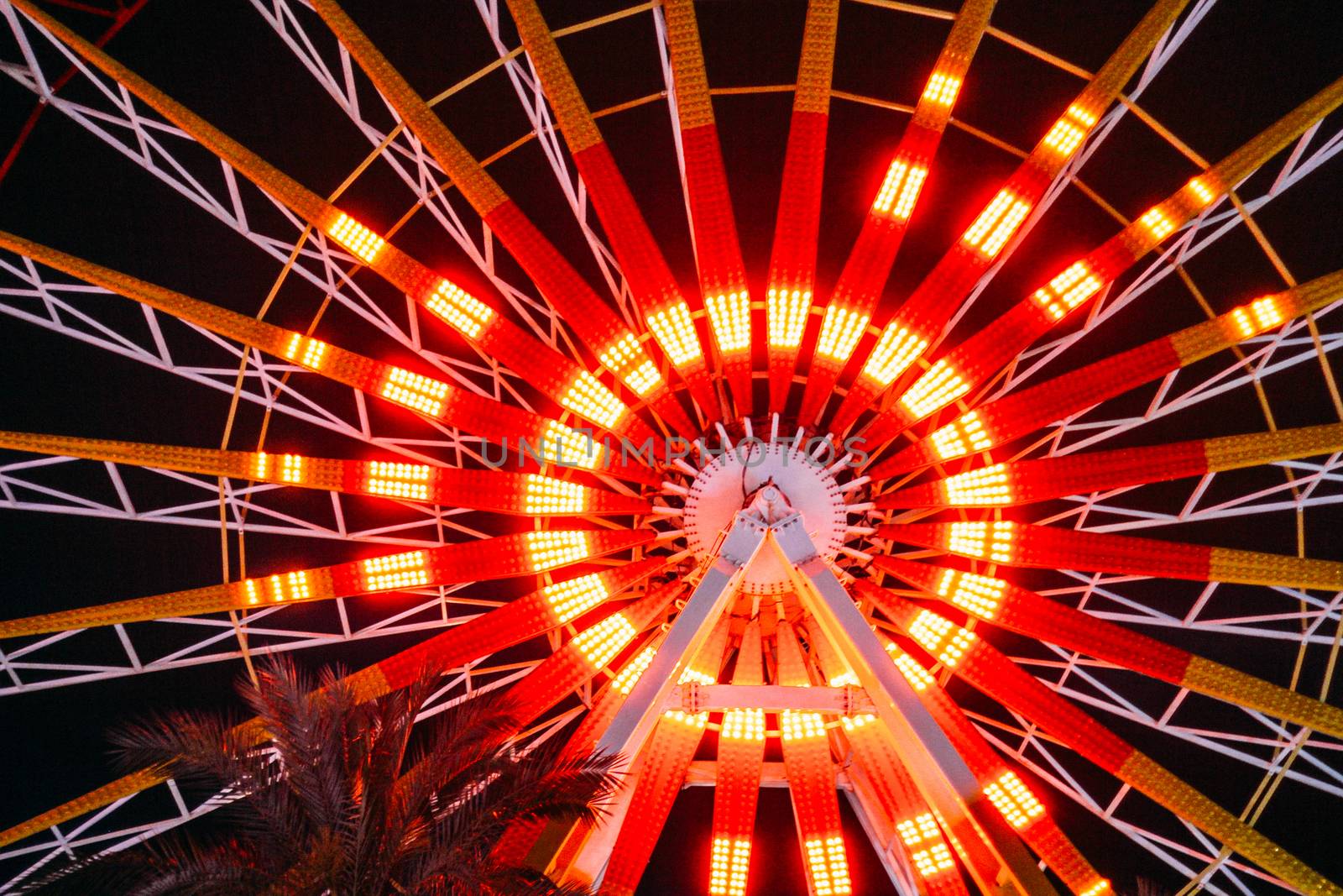 Amusement Park in Antalya, Turkey. Ferris wheel, night, close-up. Aktur Park