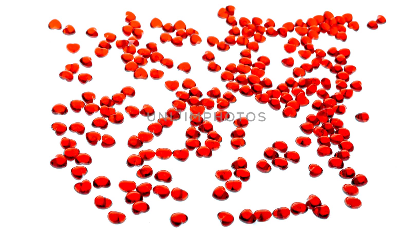 Red glass heart on a white background