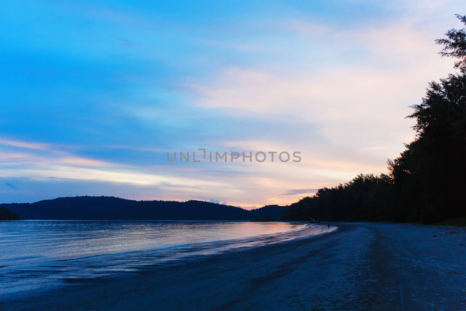 Unique sea sunset with bright colored sky