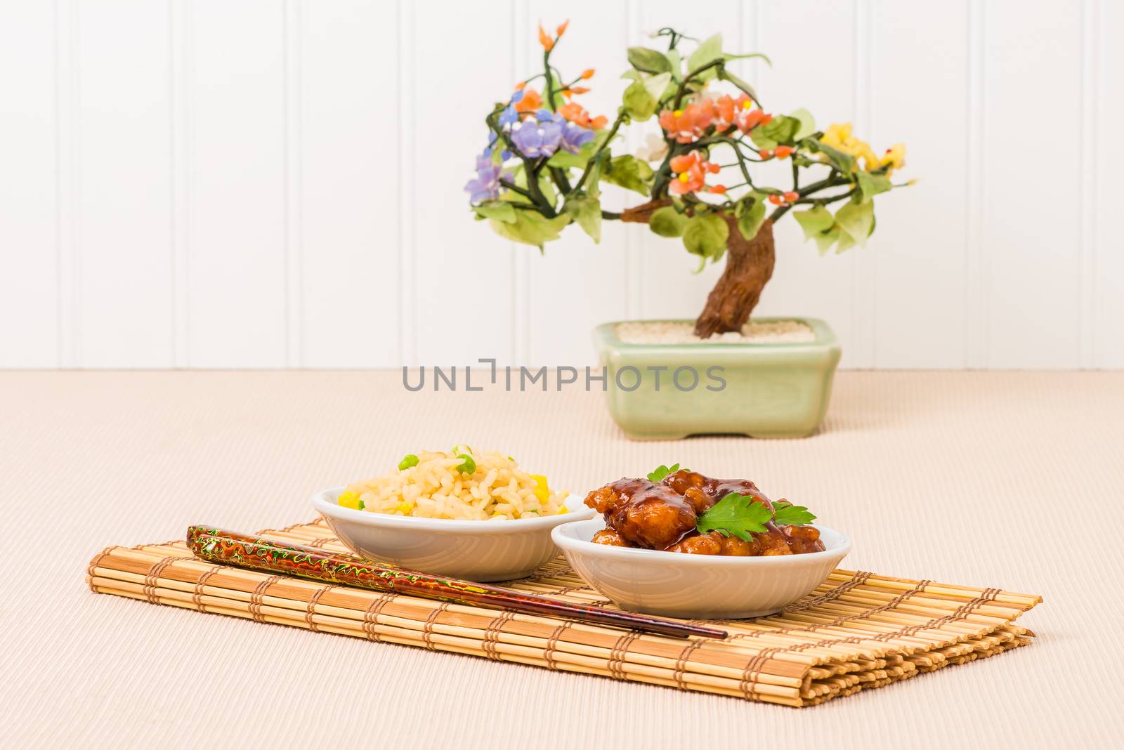 General Tao chicken served with vegetable fried rice.