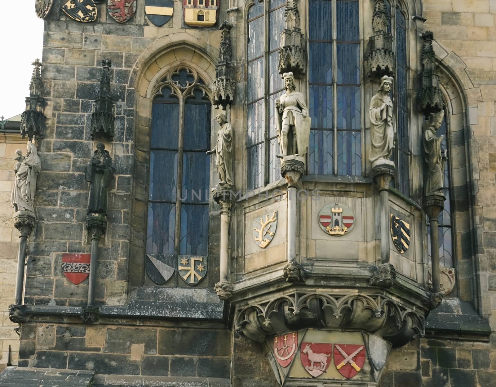 Statues and decor on the walls of old Prague town hall