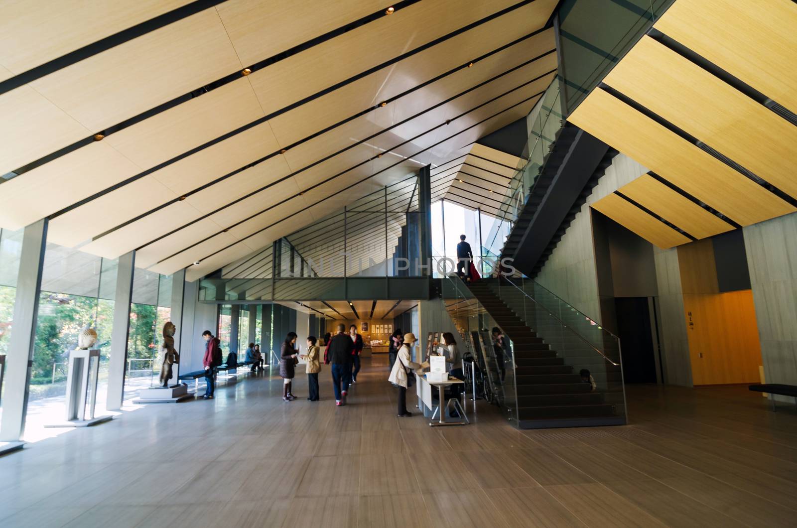 Tokyo, Japan - November 24, 2013: People visit Nezu Museum in Tokyo, Japan. The museum re-opened in fall 2009 with a completely new museum building by the Japanese architect Kengo Kuma.