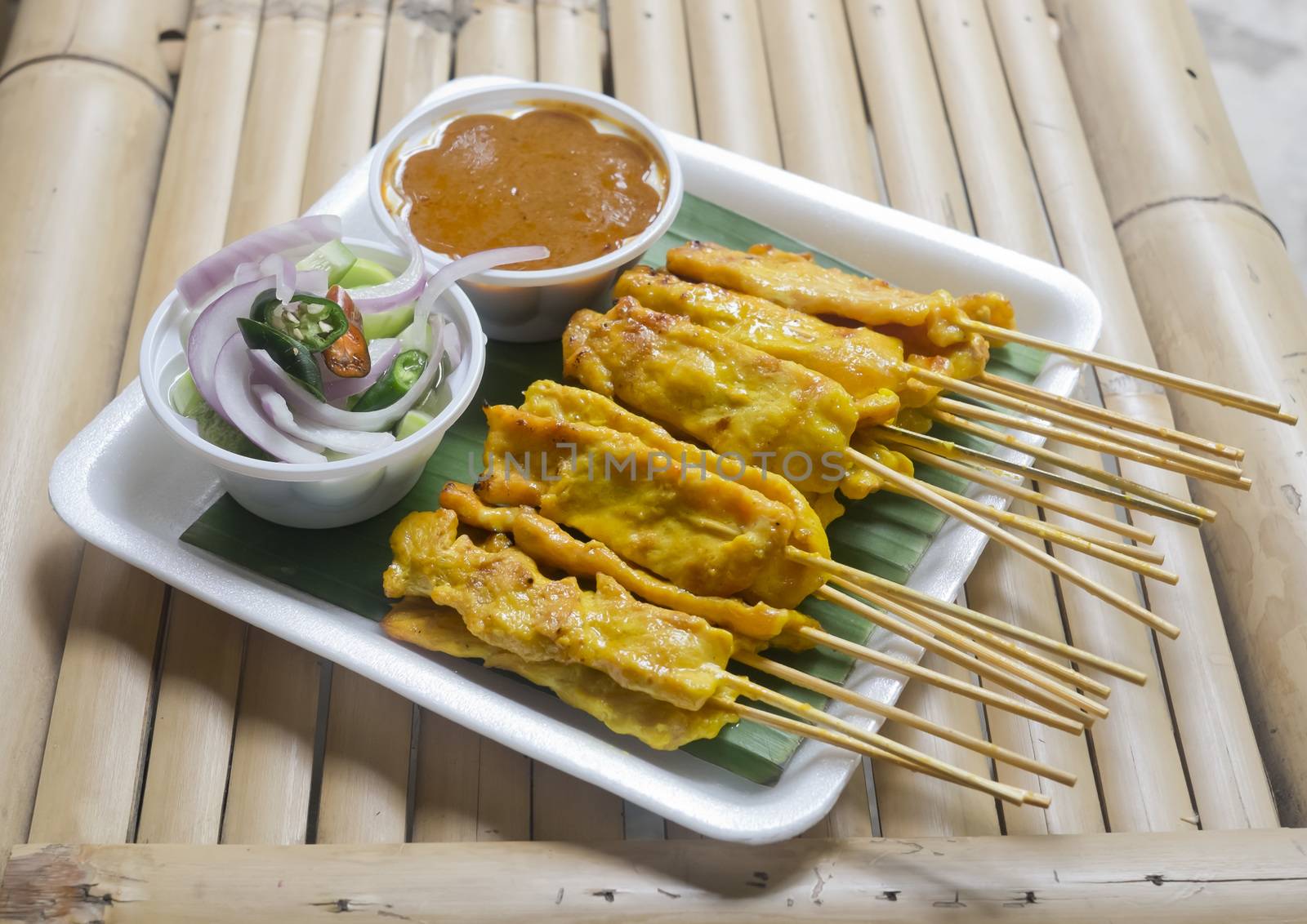Pork Satay with Peanut Sauce and Cucumber Relish by art9858