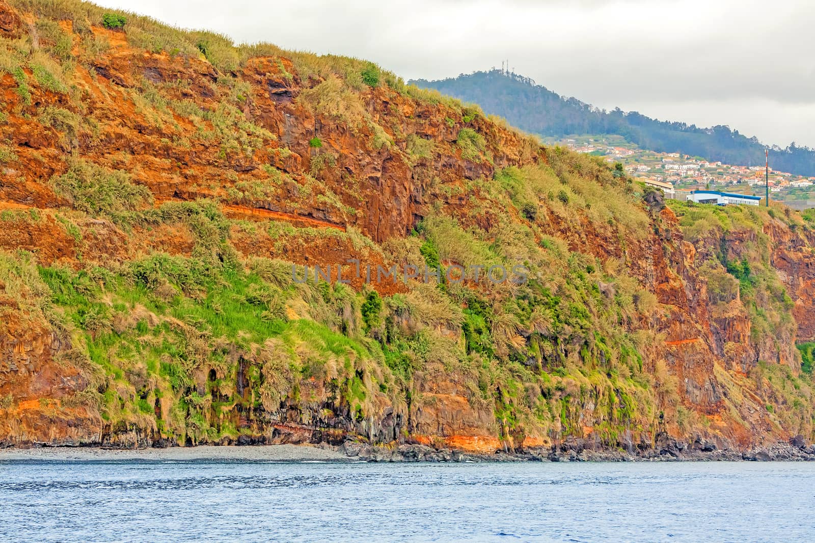 Colorful rocky cliff coast of Madeira between Jardim do Mar and Calheta