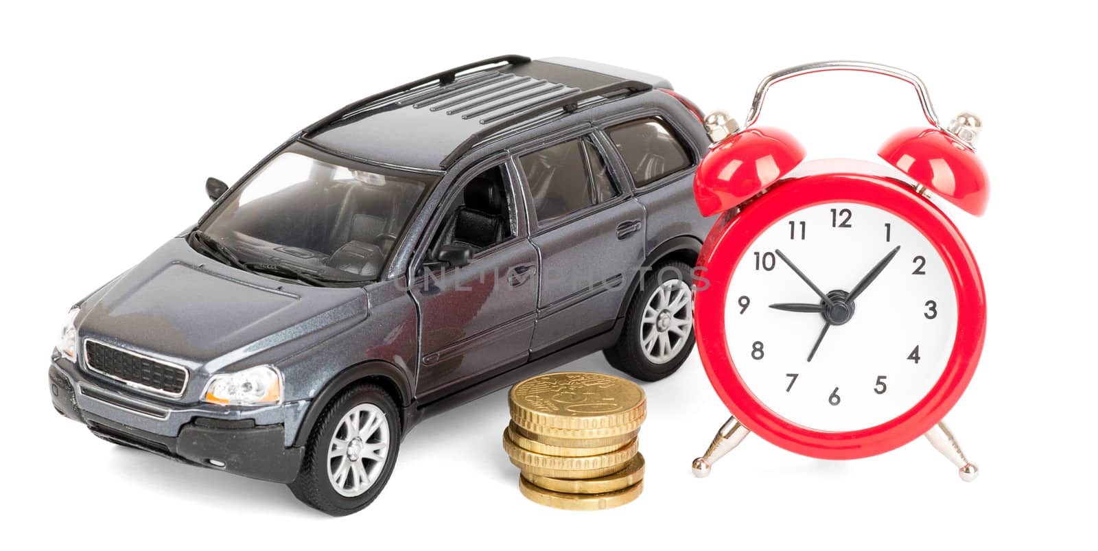 Car with coins and alarm clockisolated on white background