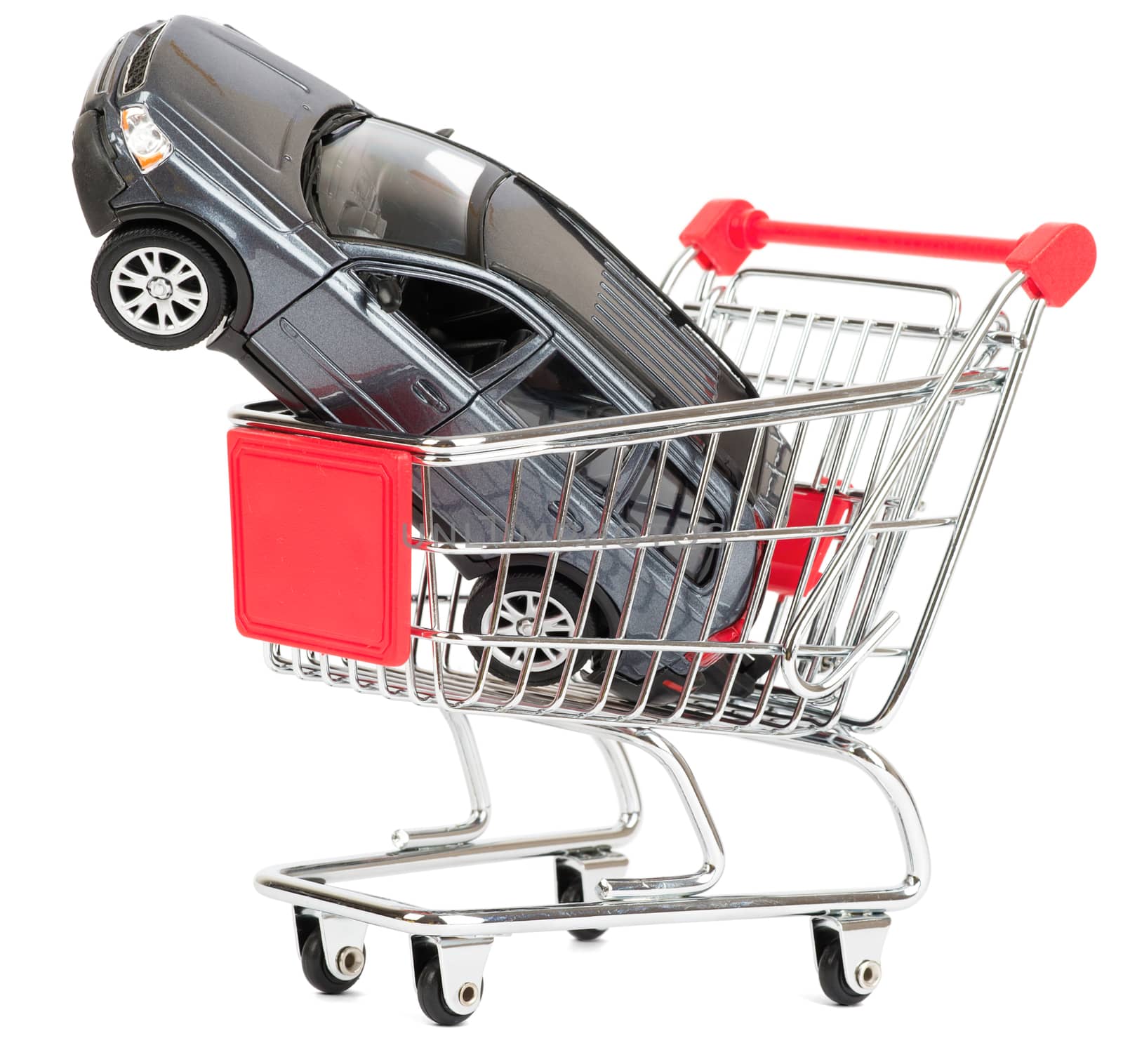 Car in shopping cart isolated on white background