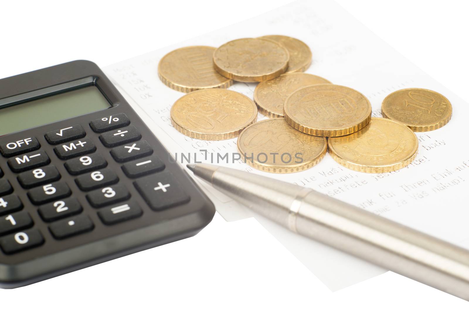 Calculator with coins and pen isolated on white background