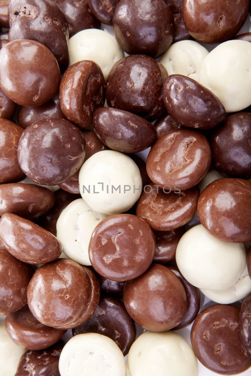 Typical dutch sweets: chocolate pepernoten (ginger nuts) for Sinterklaas; celebration at 5 december in the Netherlands in closeup