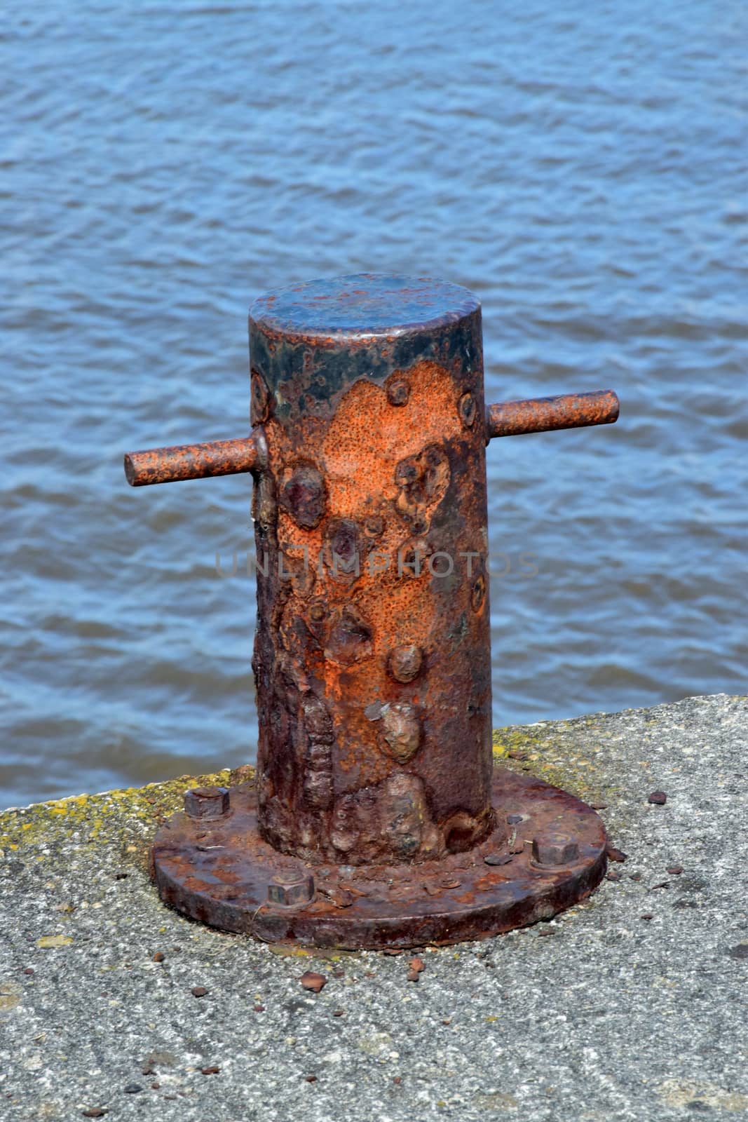 Rusted bollard. by george_stevenson