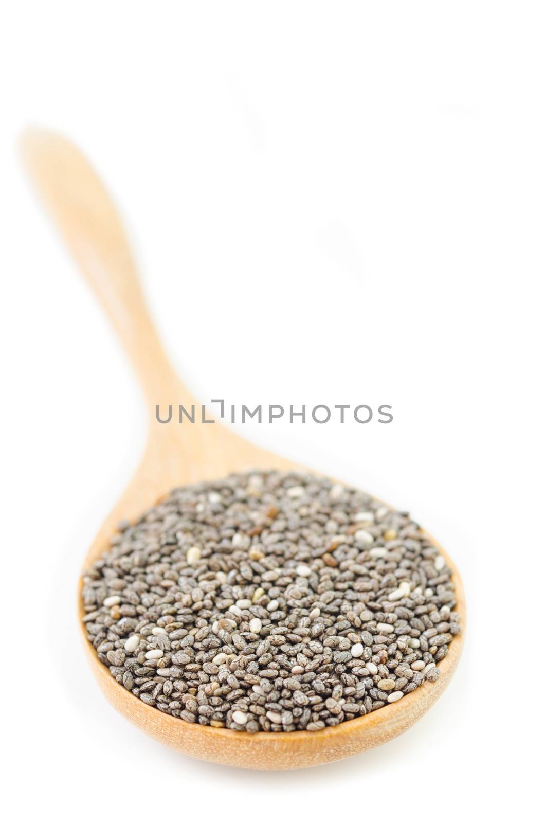 chiaseed superfoods in wooden spoon on white background.