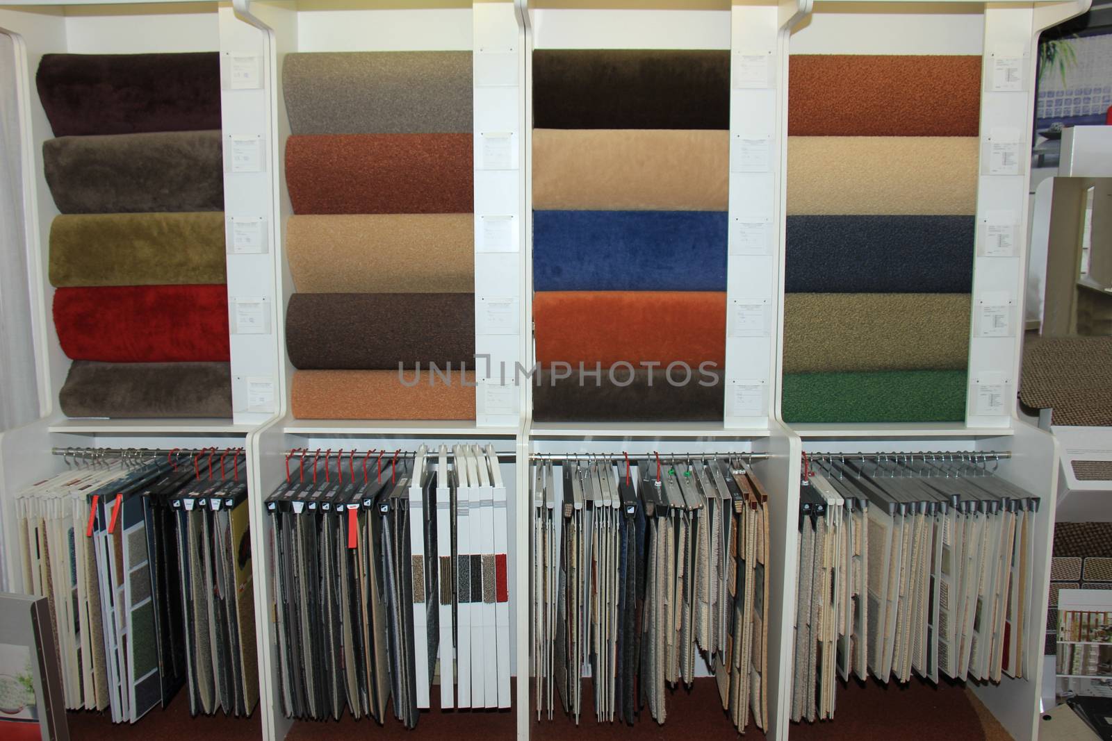 Carpet swatches in a shop by studioportosabbia