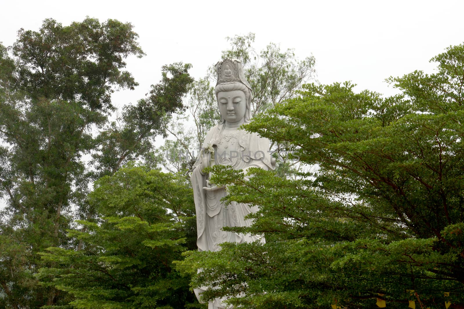 Sculptures of Chinese gods. (Kuan Yin) in the park.