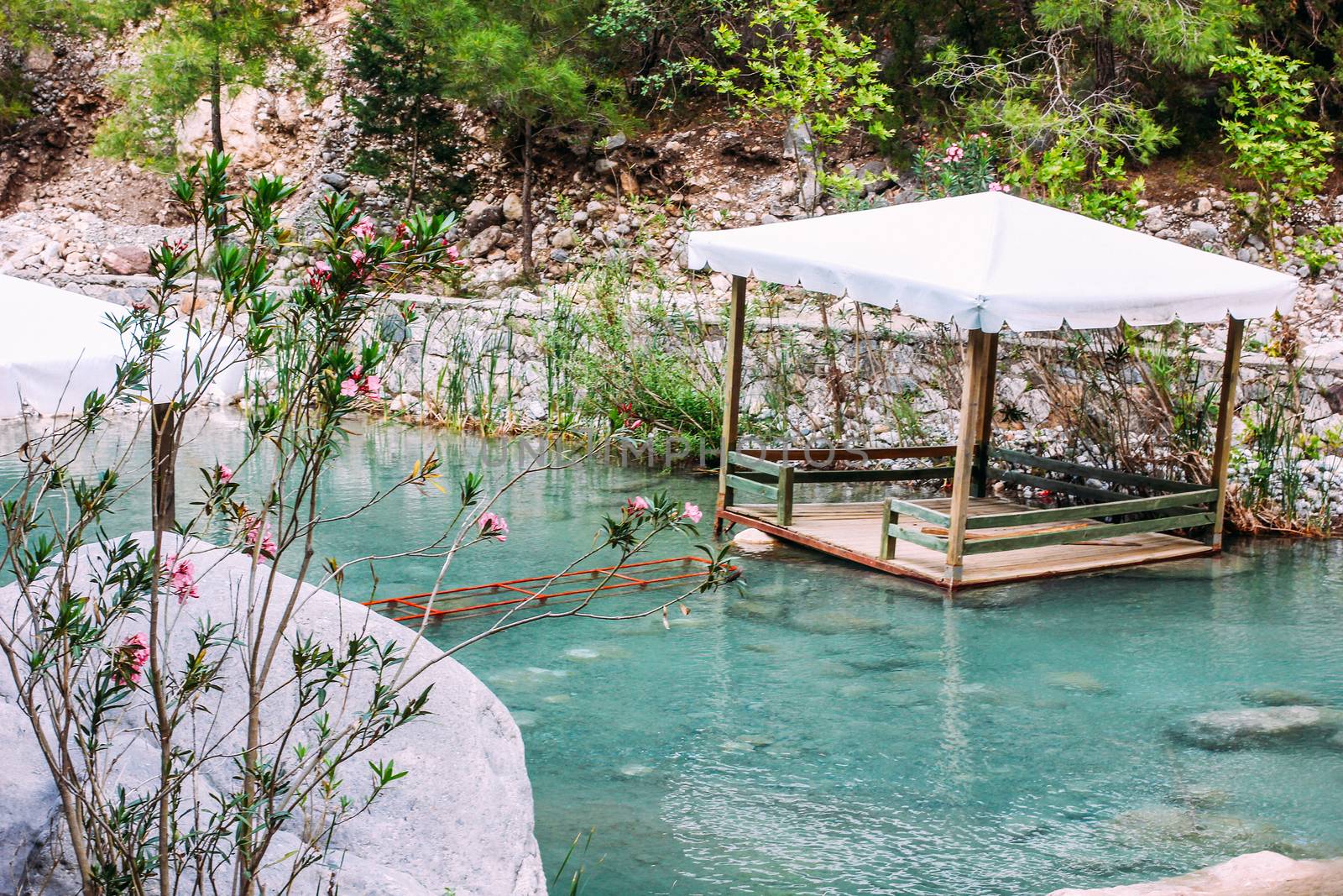 Wooden gazebo on the river. The National Park Canyon Goynuk, Turkey