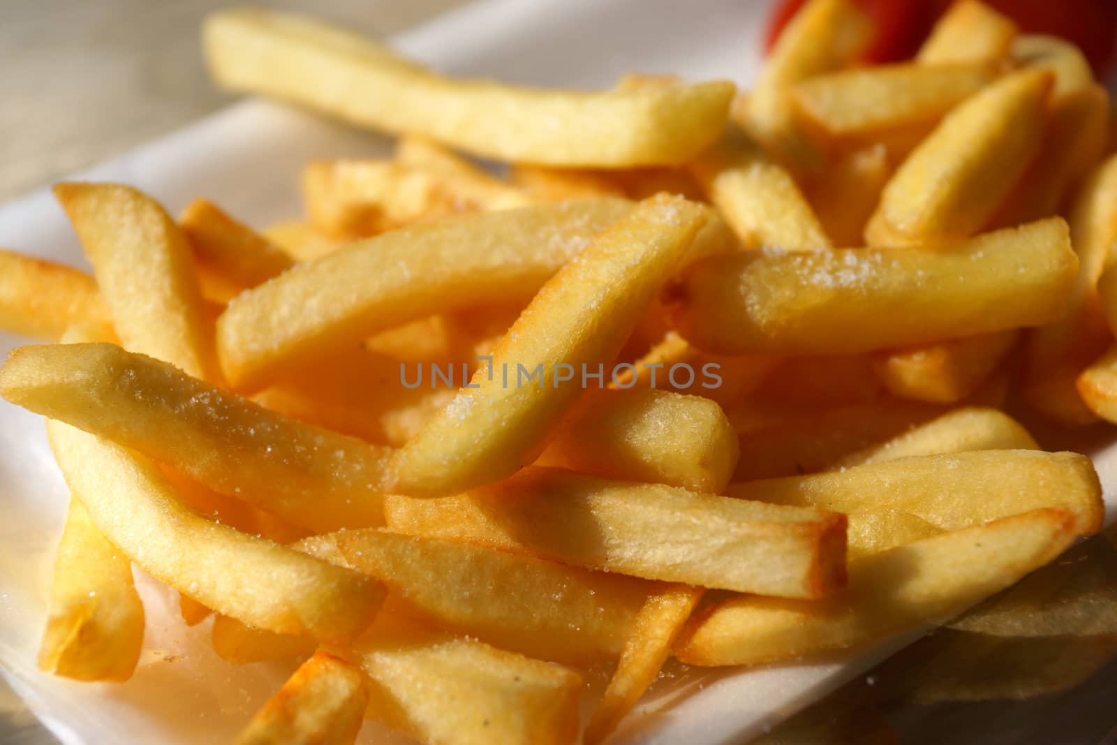 Golden French fries potatoes ready to be eaten by Noppharat_th