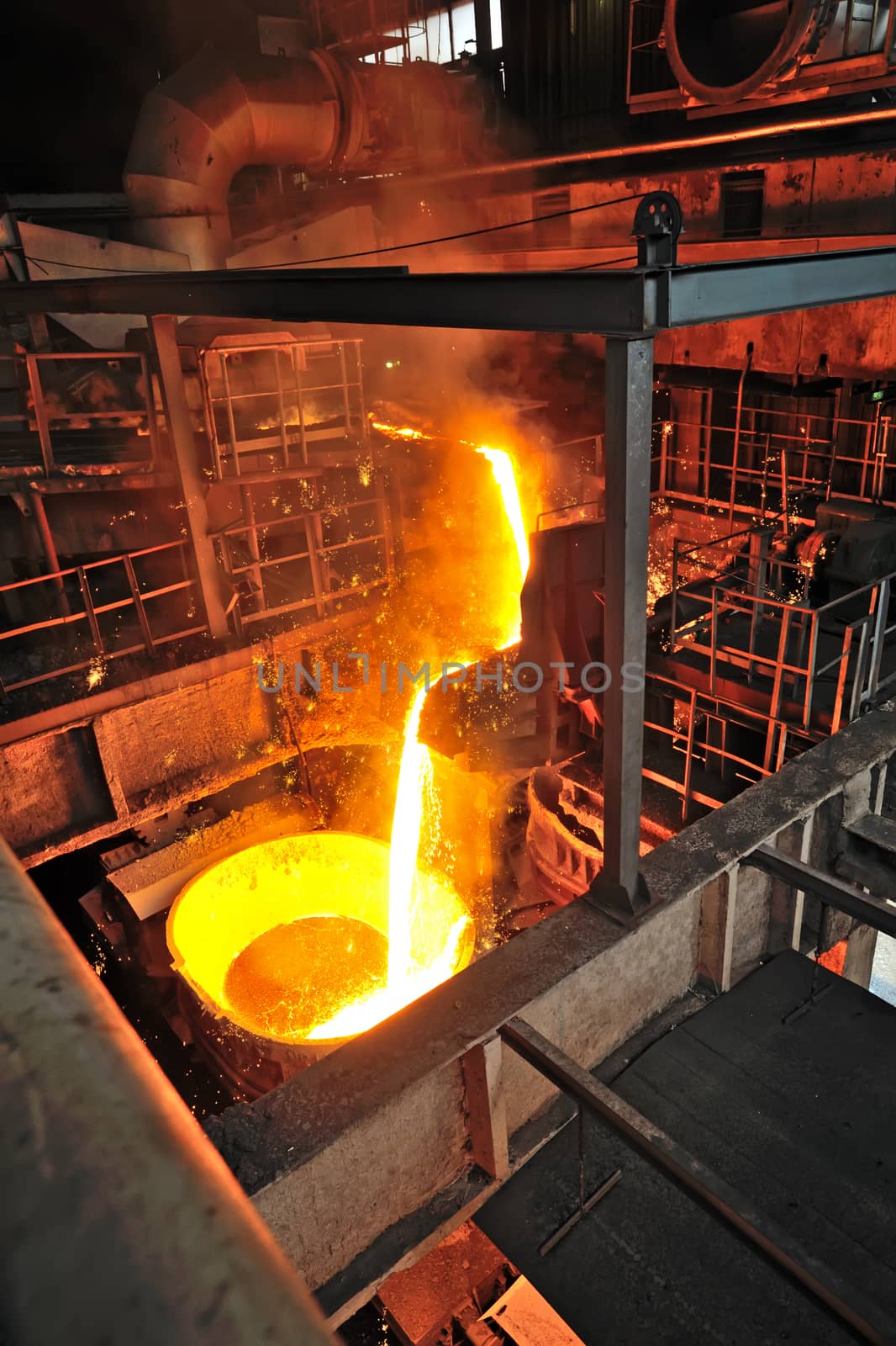 Liquid metal from blast furnace on trail