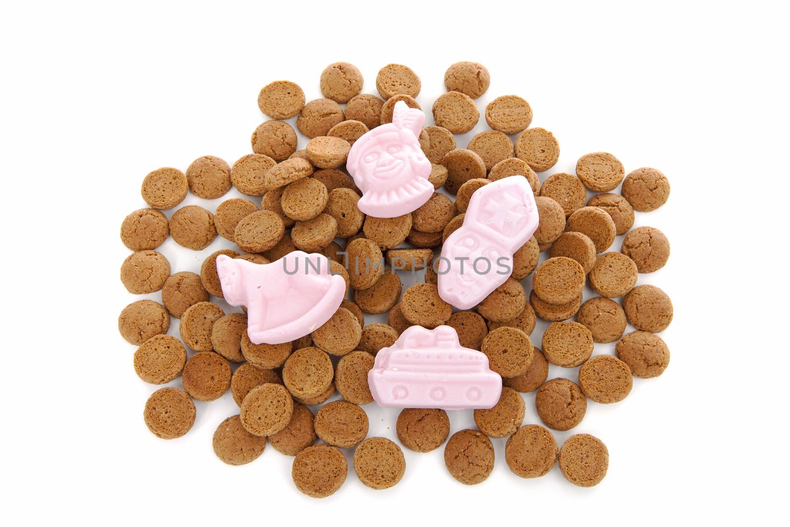 Typical Dutch sweets: pepernoten (ginger nuts) for Sinterklaas; celebration at 5 december in the Netherlands over white background