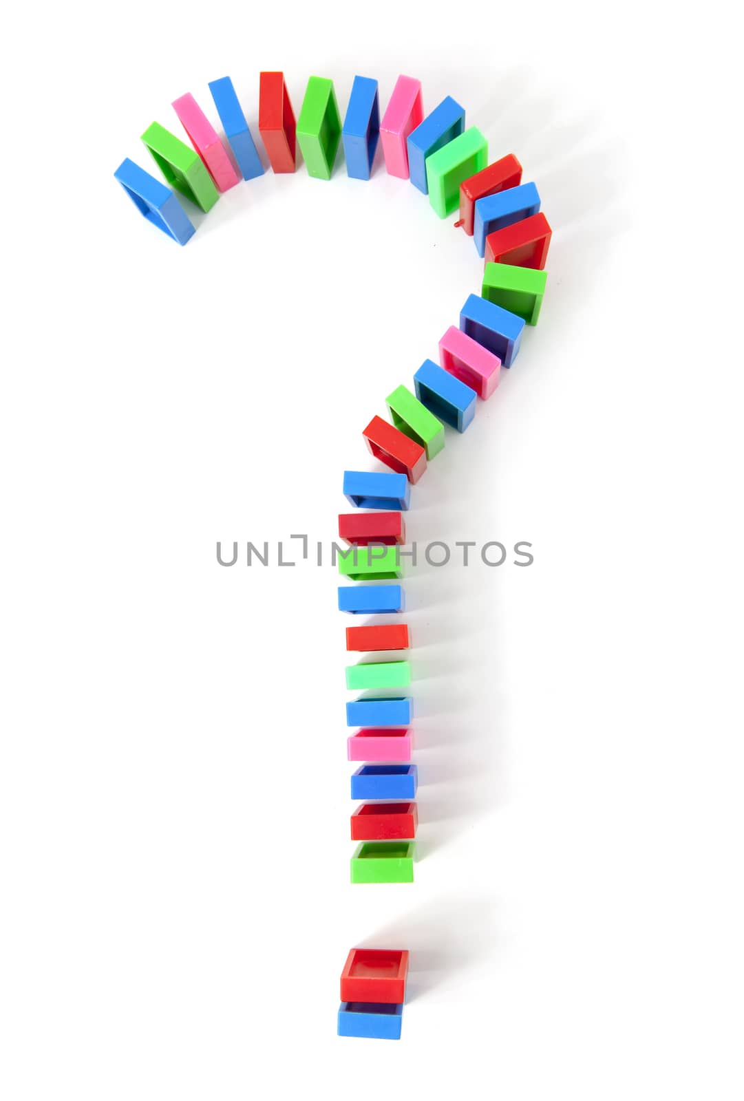 colorful domino bricks in shape of question mark isolated on white background