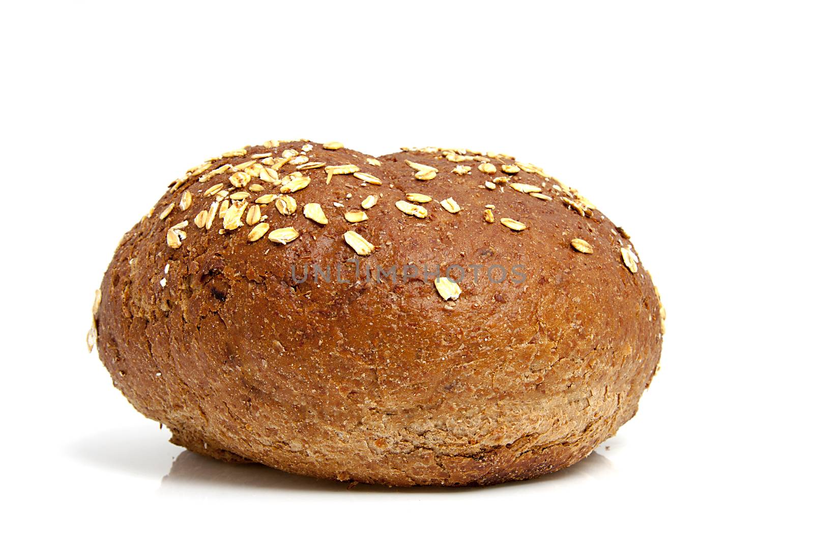 One healthy home baked bun on white background