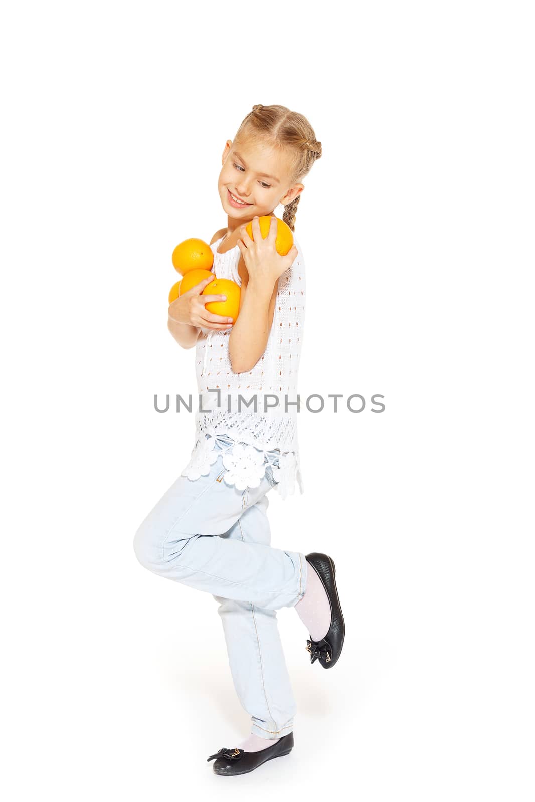 Beauty young girl with fresh oranges. Healthy lifestyle. Happiness. White background.