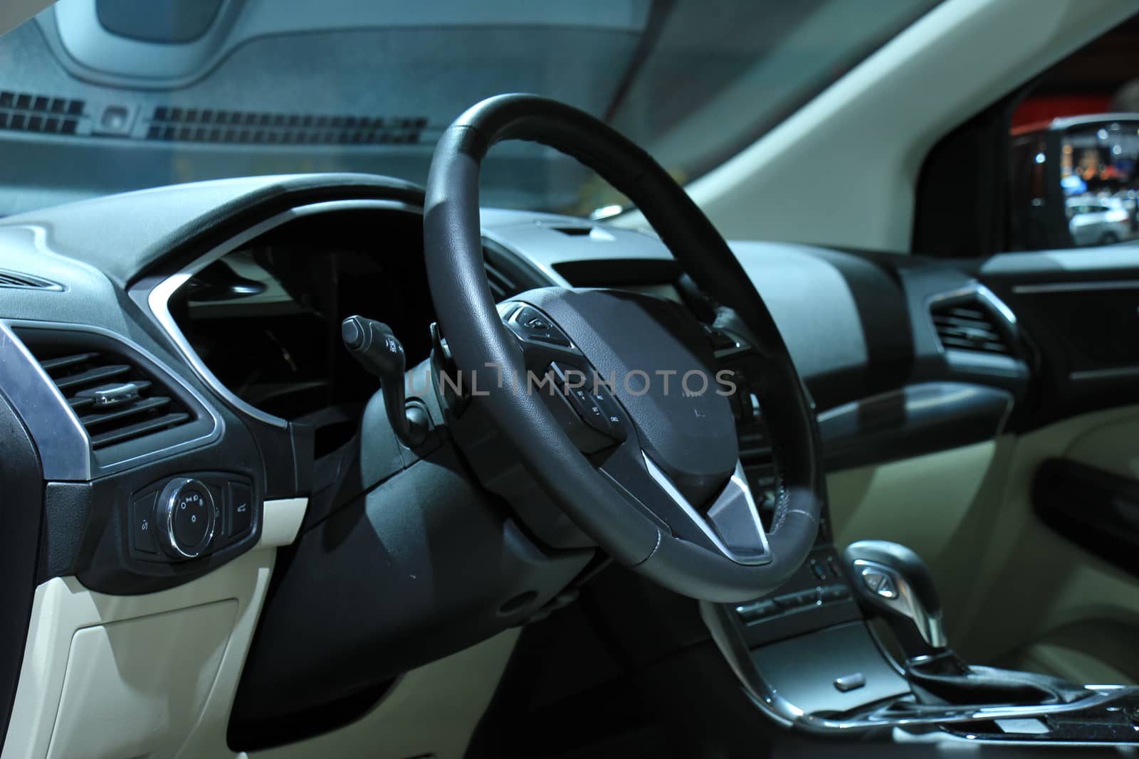 Modern car interior, luxurious materials in different shades of grey