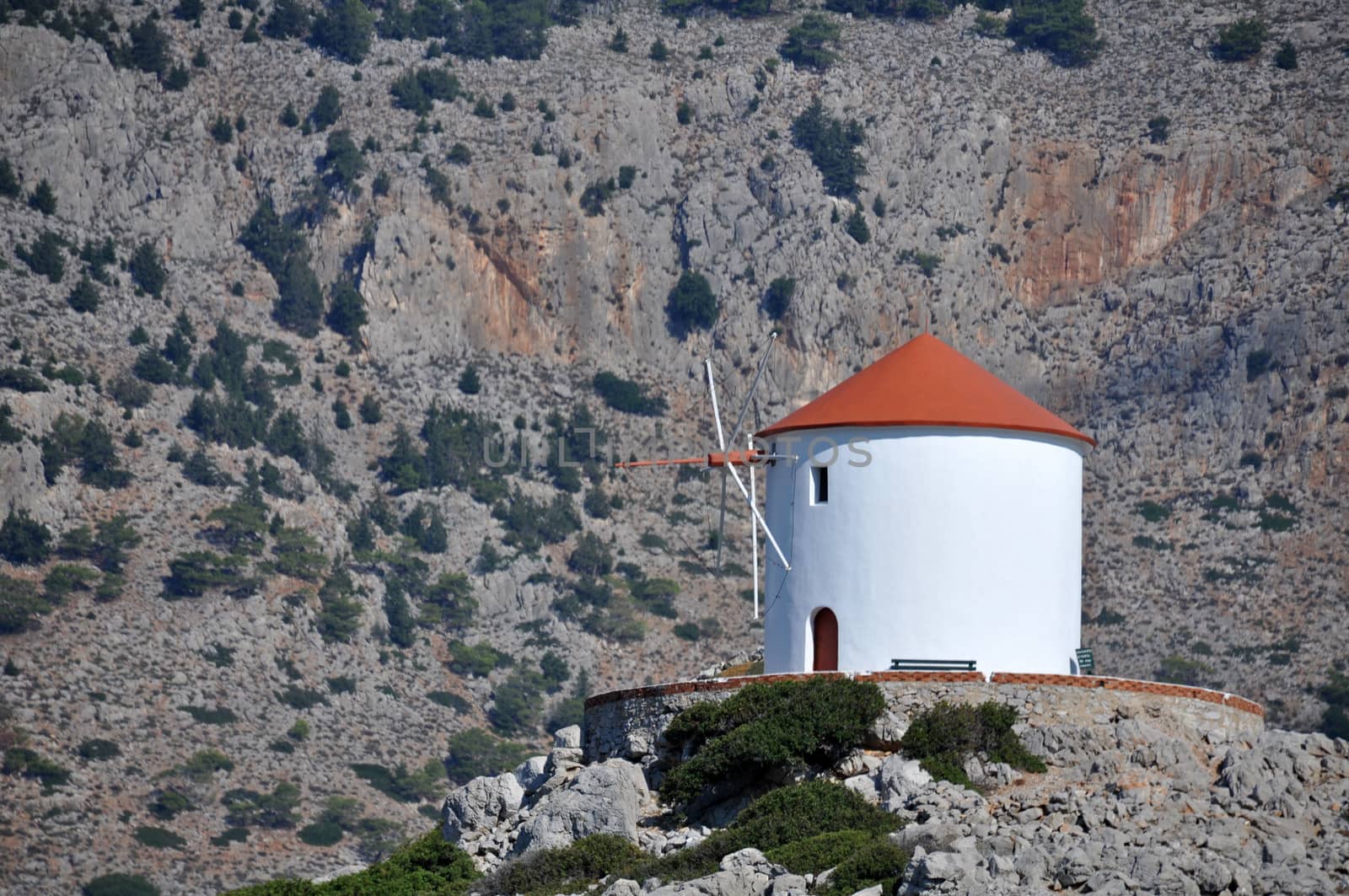 Coastal windmill at Panormitis by dpe123