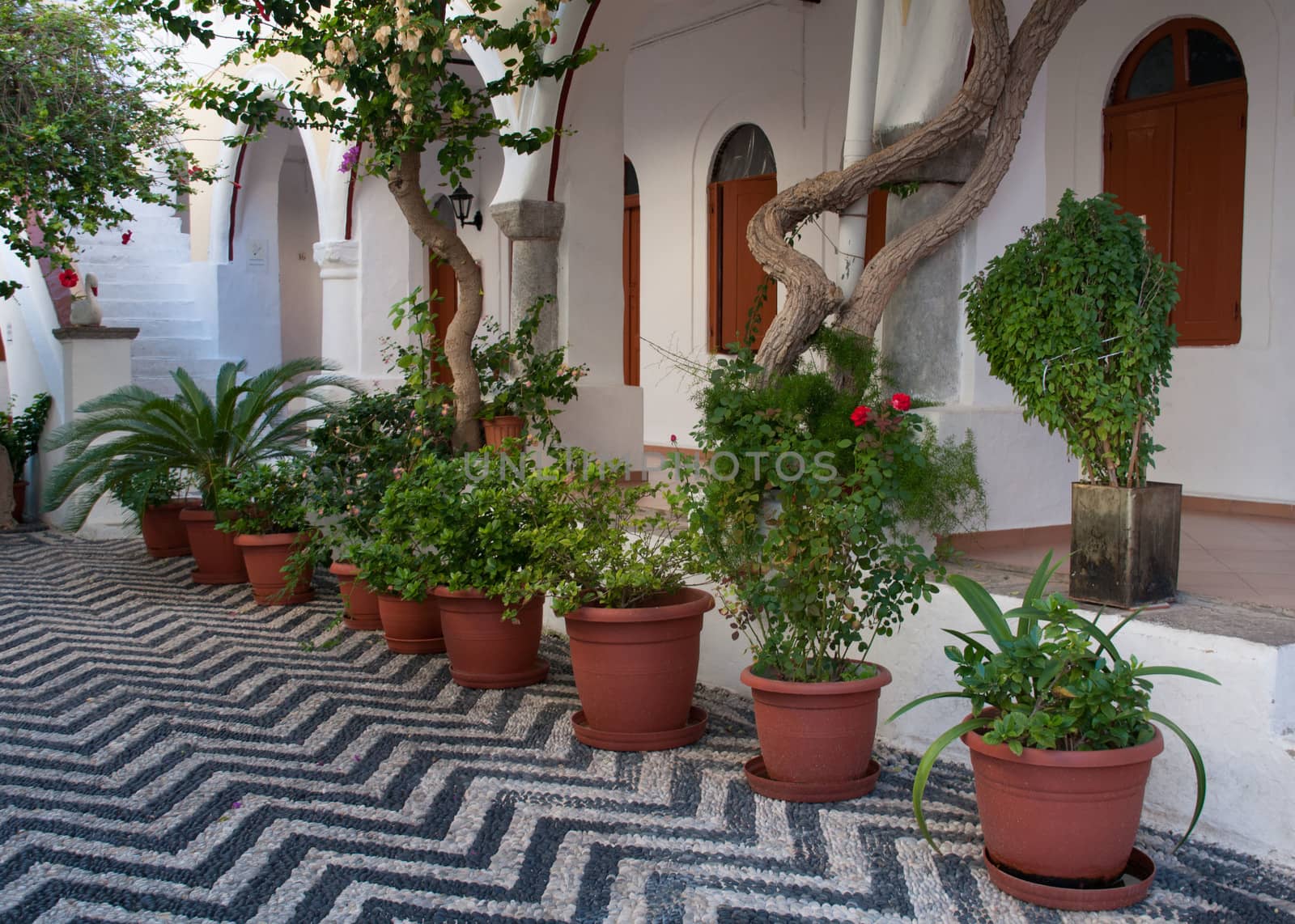 A pretty courtyard at Panormitis Monastery on the Greek Mediterranean island of Symi, near Rhodes.