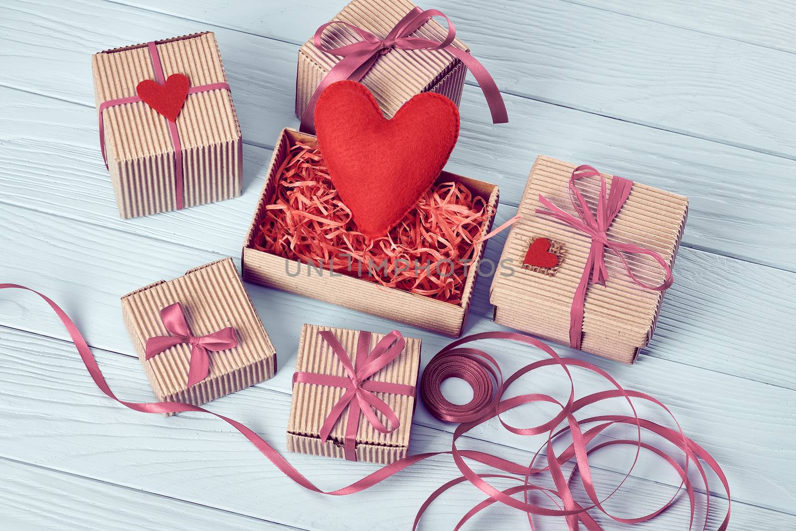 Love, Valentines Day.  Hearts, gift boxes on wood by 918
