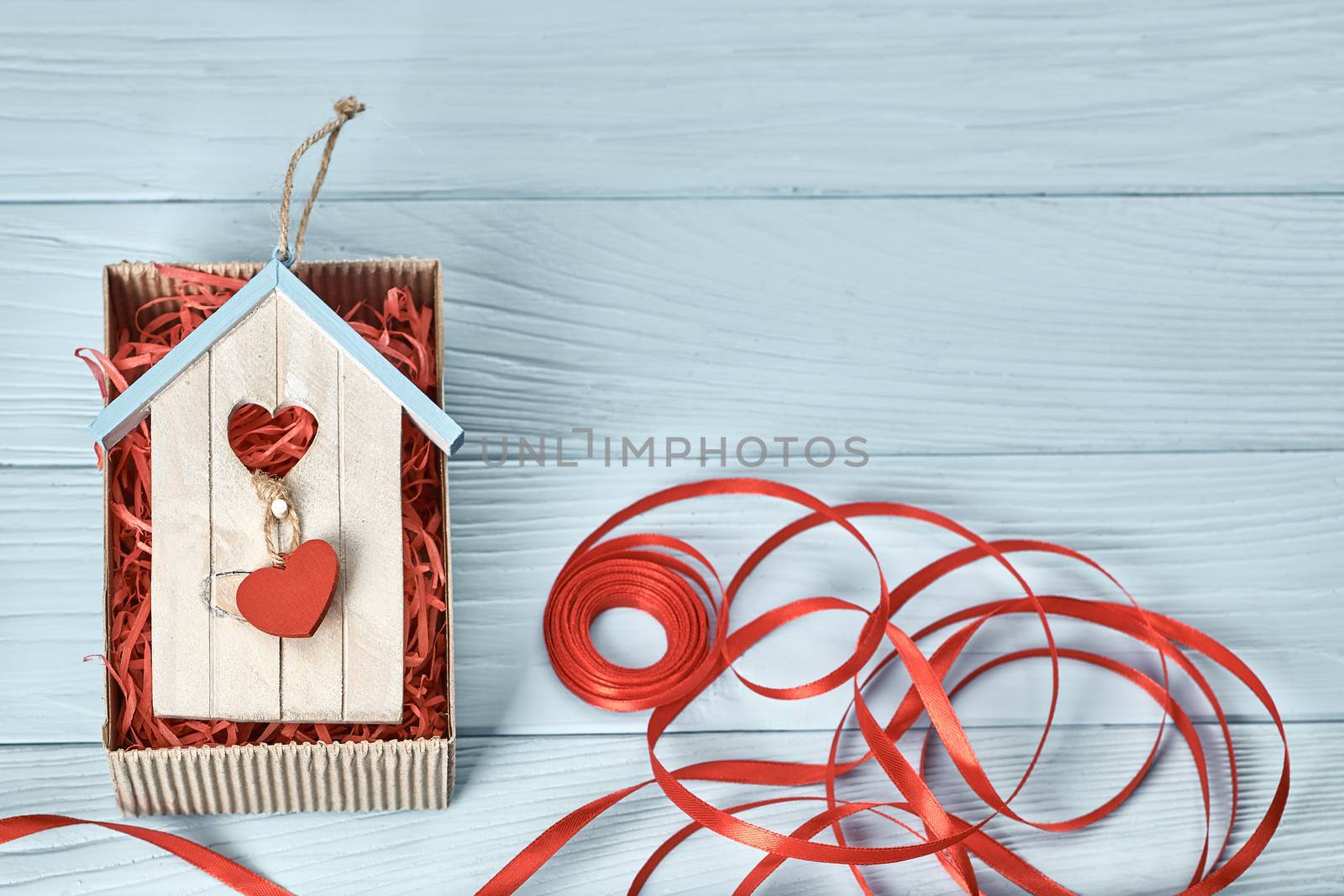 Valentines Day. Love hearts, gift box, ribbon, handmade  paper card. Vintage retro romantic style. Marriage proposal concept. Unusual creative greeting card, wooden blue background, copyspace, toned