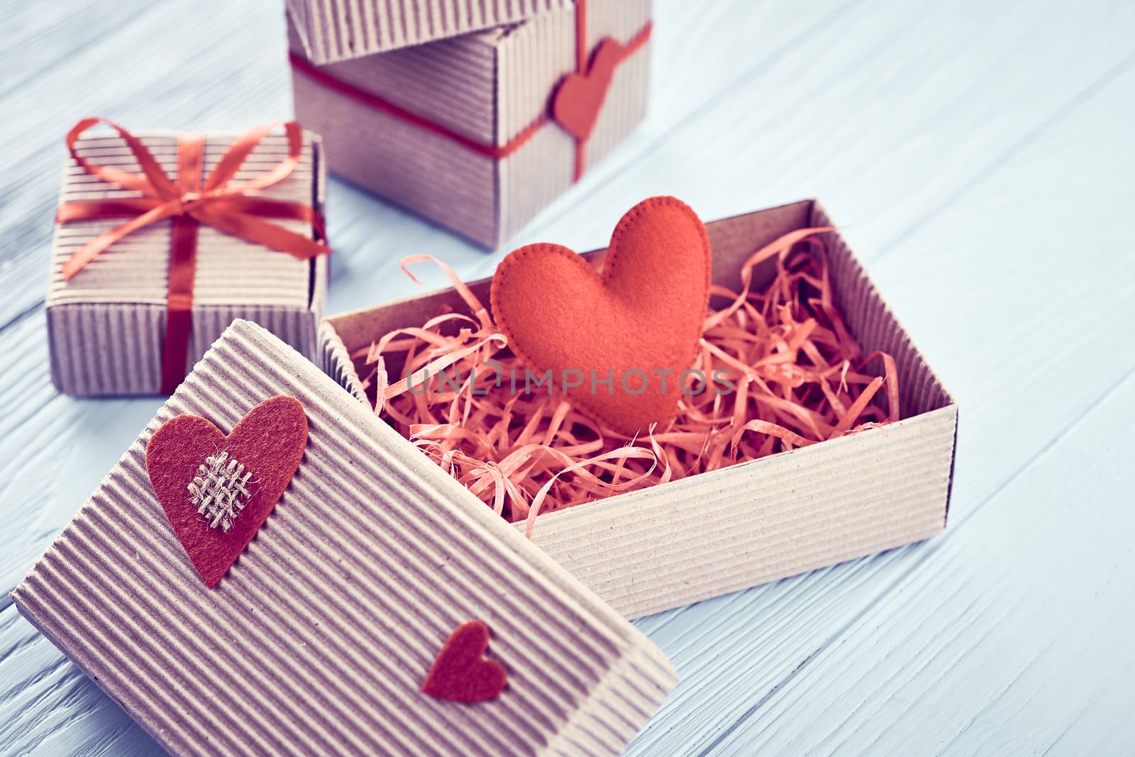 Love, Valentines Day.  Hearts, gift boxes on wood by 918