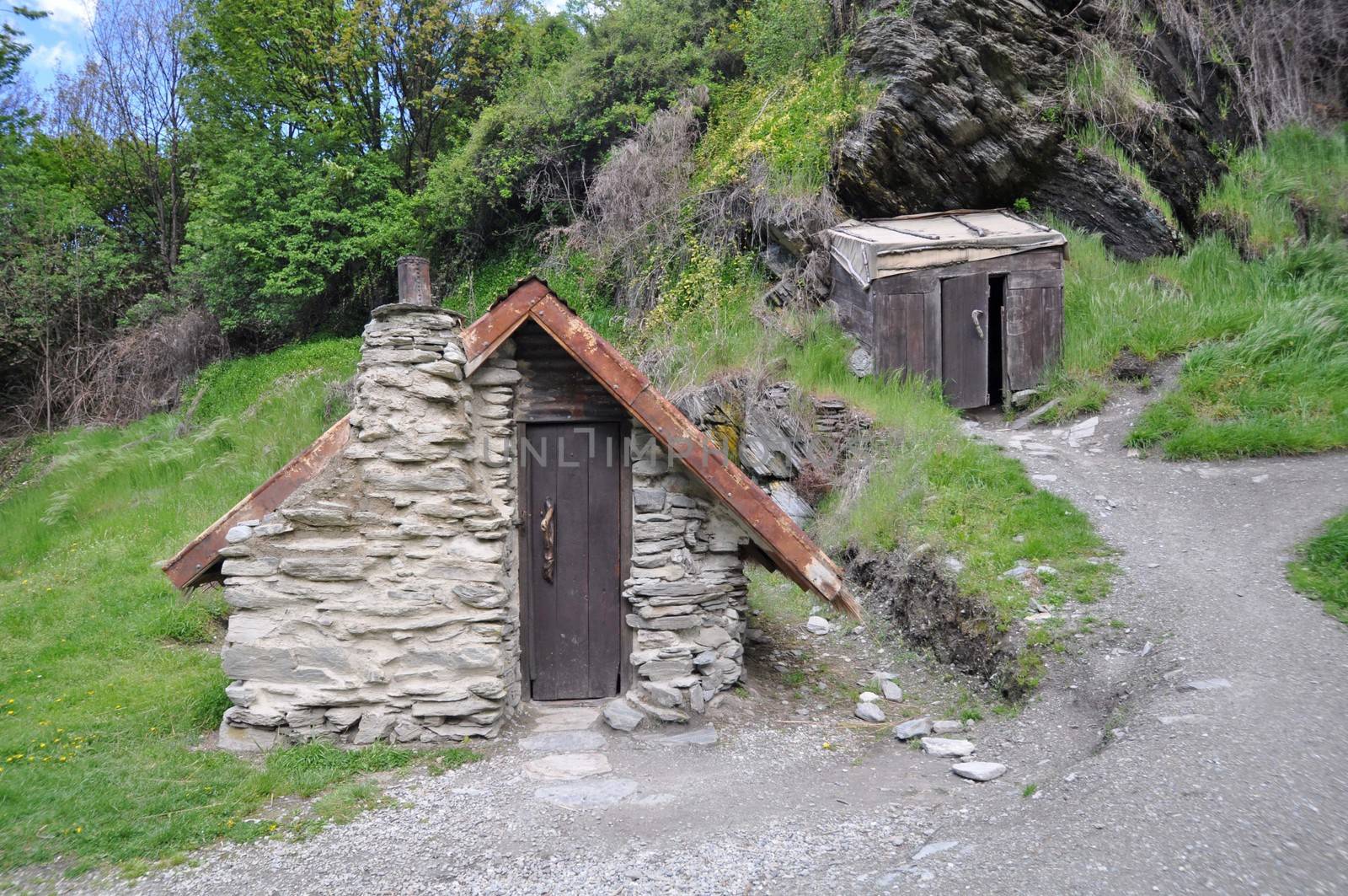 Arrowtown, near Queenstown, Otago, New Zealand, is the best example of a goldrush era miners settlement, These Chinese gold diggers arrived during the 1860's gold rush. They made and lived in these primitive huts.