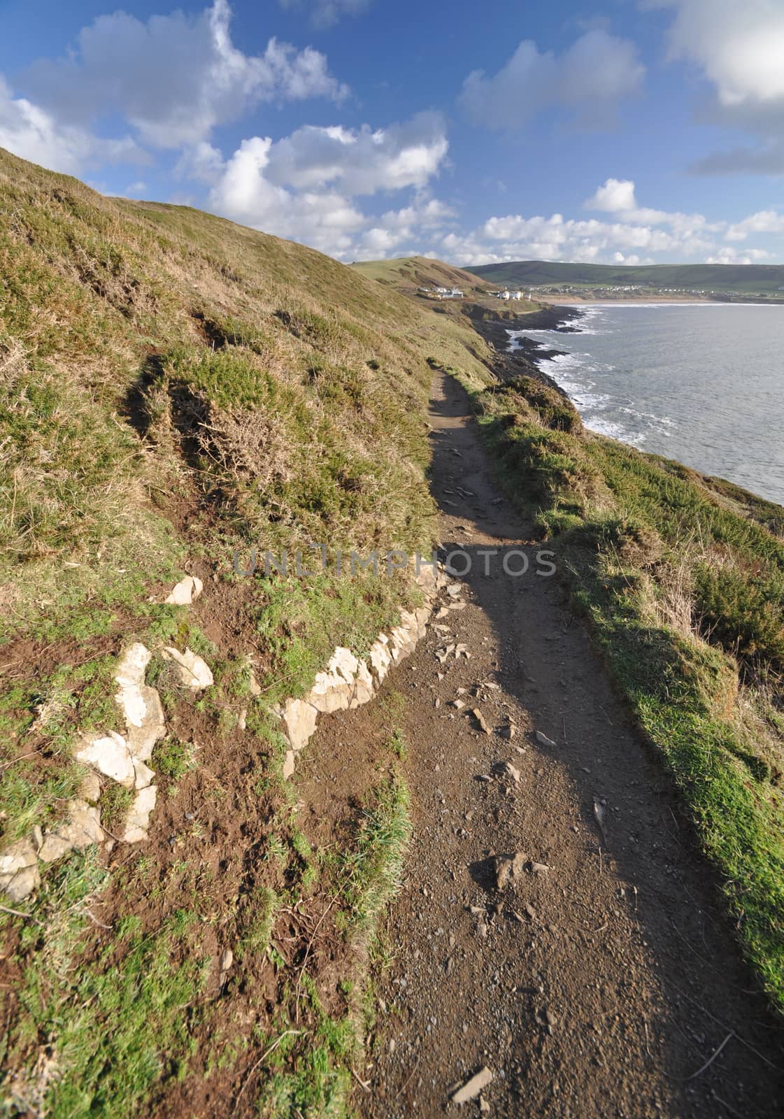 Southwest Coast footpath near Baggy Point headland looking back towards, Croyde, North Devon, England