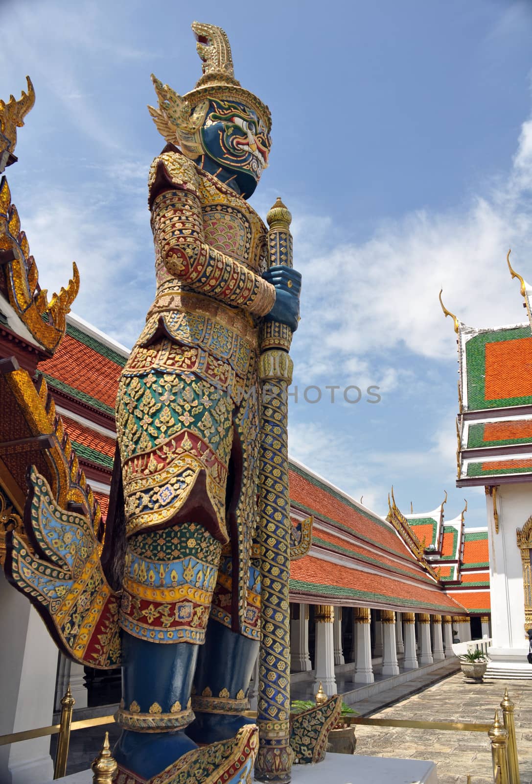 This statue is a guard outside the Chedi at the Grand Palace. Built as the final resting place of the Emerald Buddha ( Phra Kaeo) surrounded by the kings residence, it is Thailands holiest temple