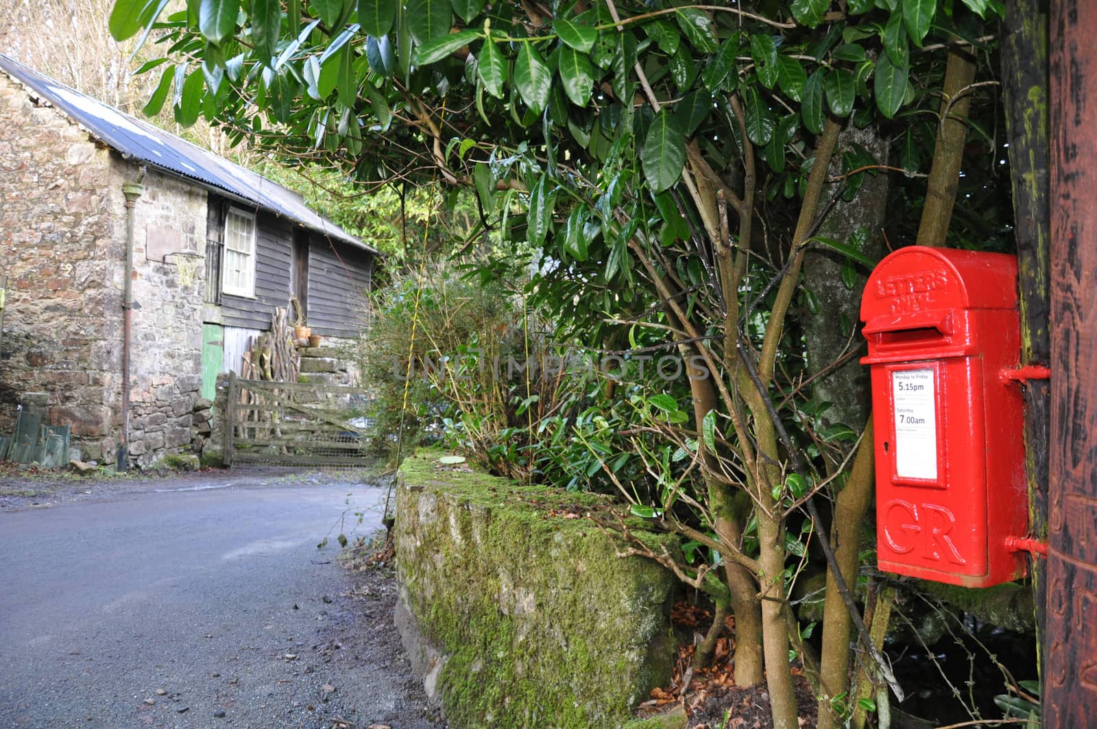 An English village post box. Taken in the village  of Belstone, on the northern edge of Dartmoor in Devon - A standard Royal Mail design used throughout the UK. 