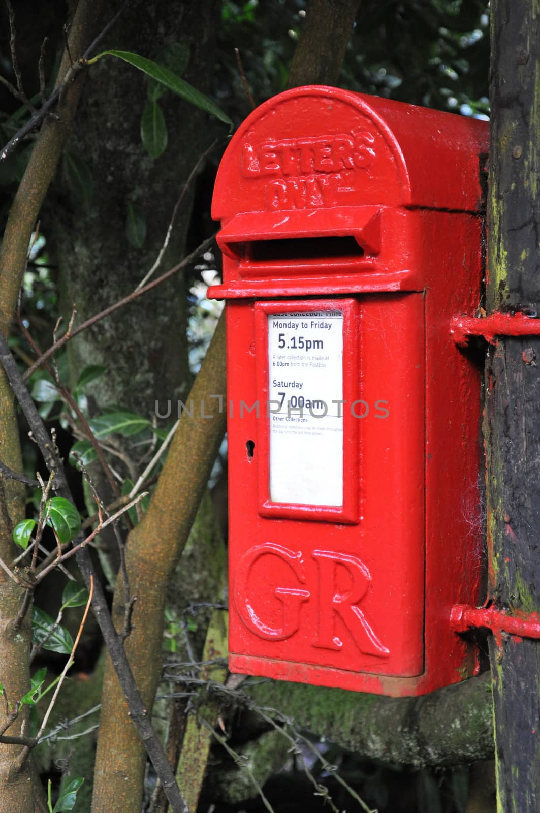 An English village post box . Taken in the village  of Belstone, on the northern edge of Dartmoor in Devon - A standard Royal Mail design used throughout the UK.
