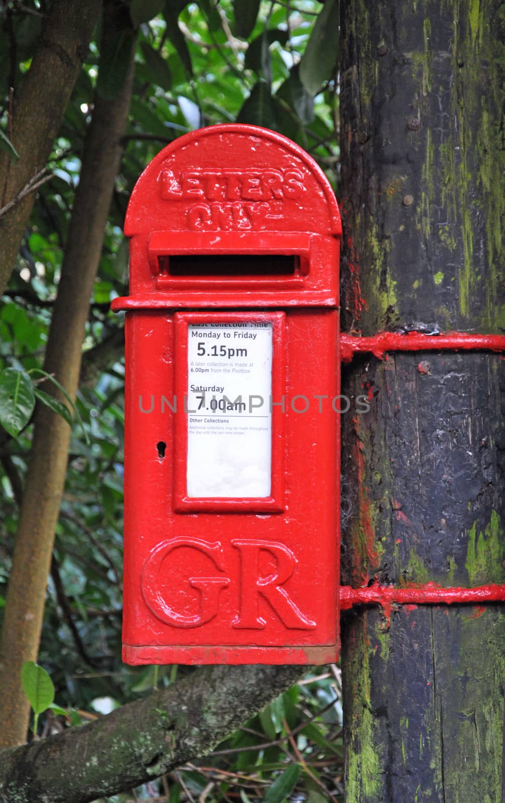 An English village post box. Taken in the village  of Belstone, on the northern edge of Dartmoor in Devon - A standard Royal Mail design used throughout the UK.