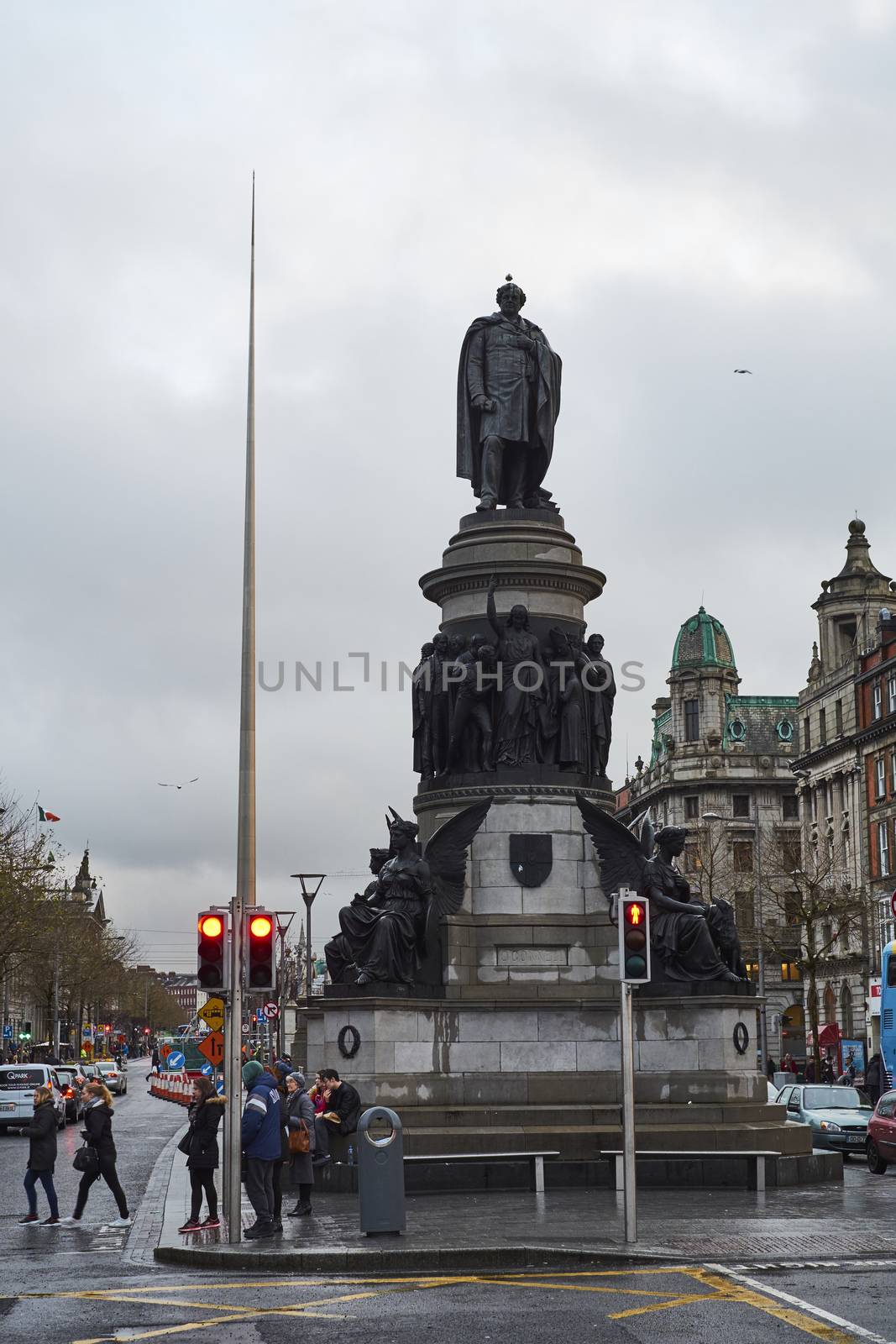 DUBLIN, IRELAND - JANUARY 05: Statue of Daniel O'Connell with overcast sky and Millennium Spire in the background. January 05, 2016 in Dublin