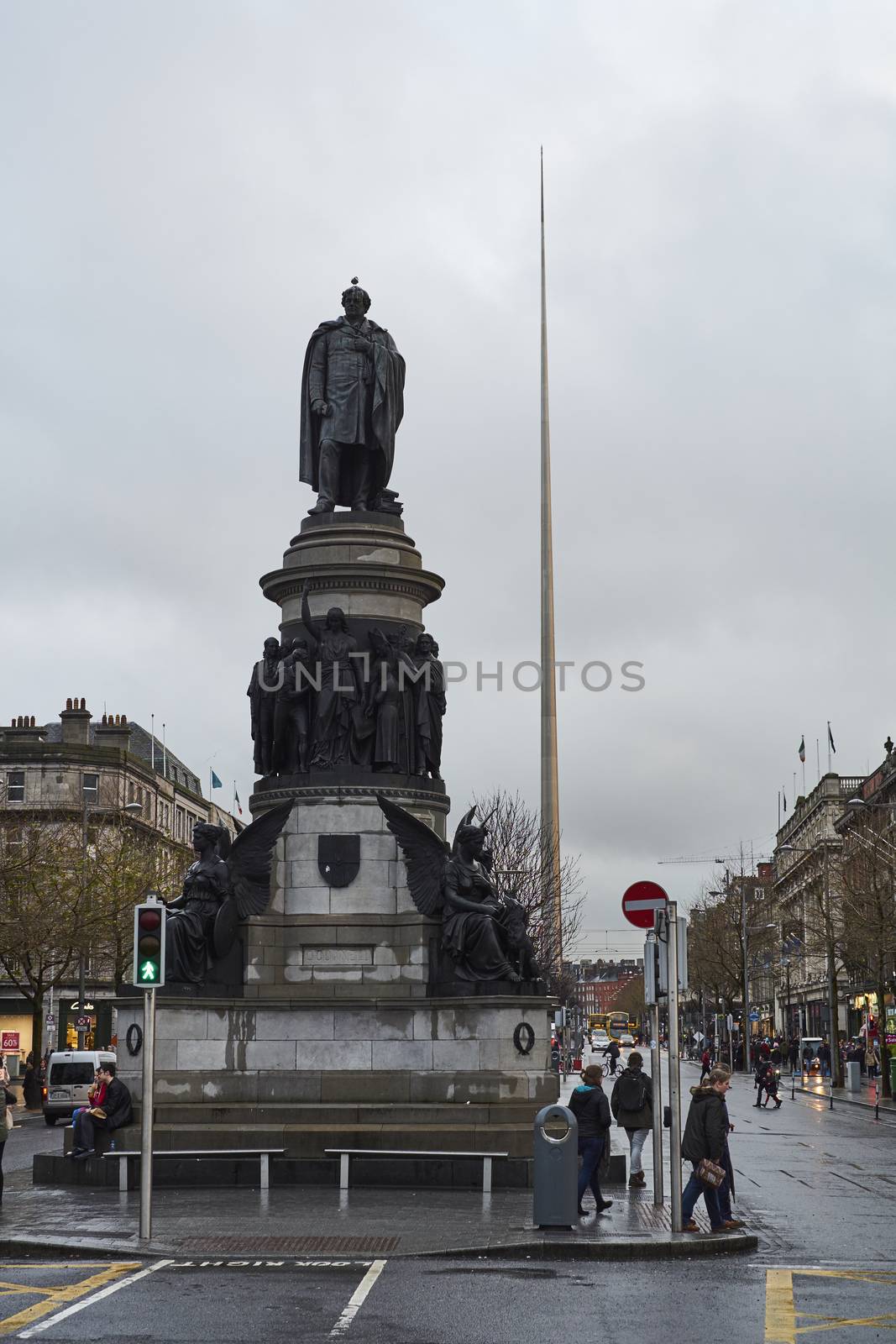DUBLIN, IRELAND - JANUARY 05: Statue of Daniel O'Connell with overcast sky and Millennium Spire in the background. January 05, 2016 in Dublin