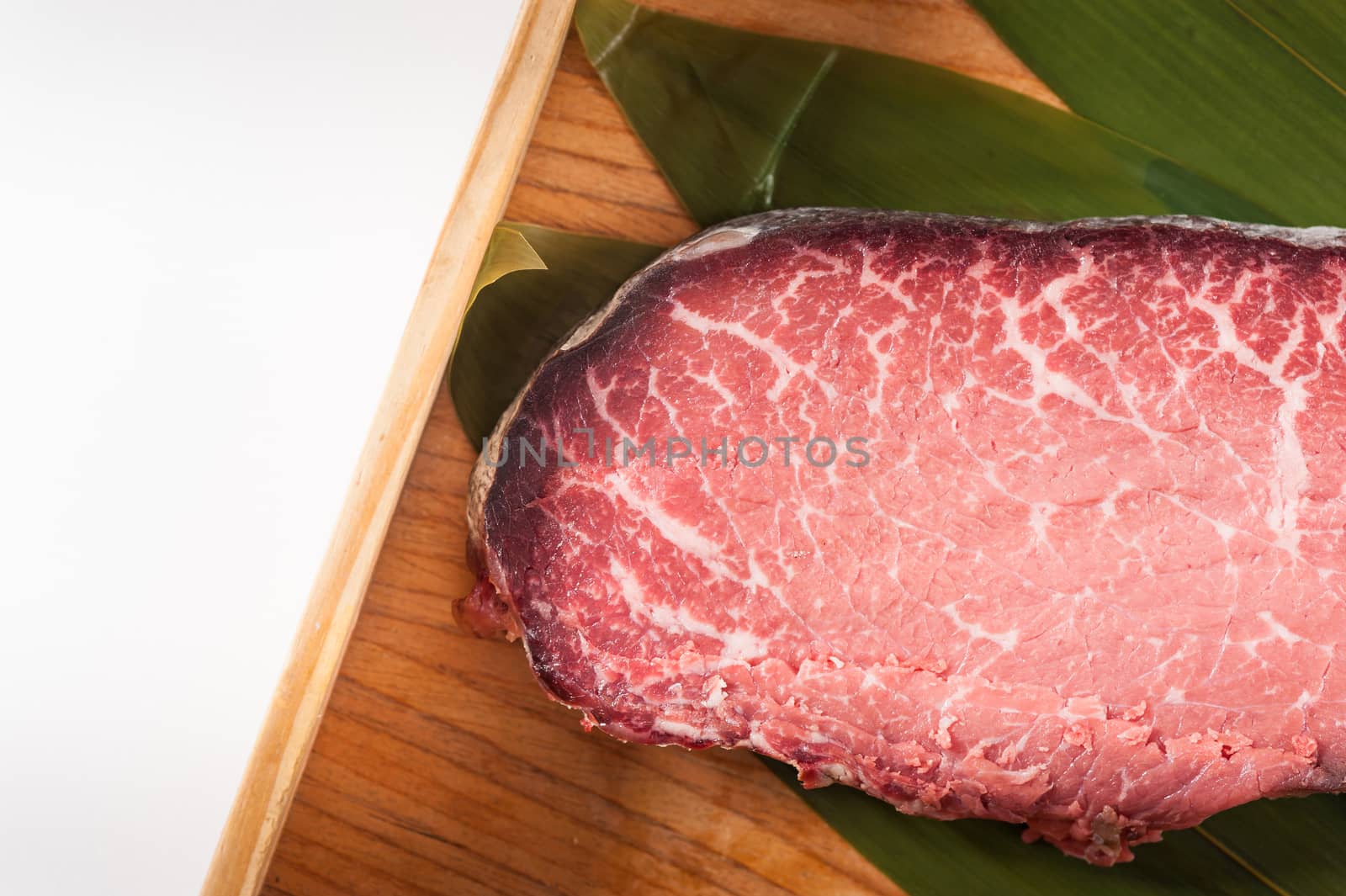Dry-aged beef in wood tray