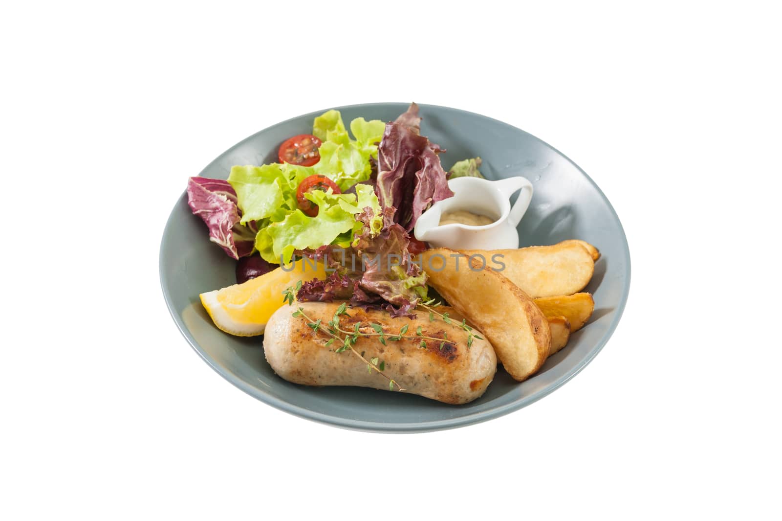 Grilled sausage with fried potatoes and salad isolated on white background with clipping path
