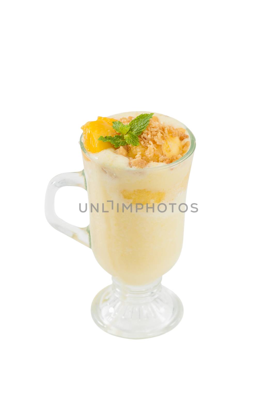 Mango cobbler shale, Mango milk shake with bits og mango and crackers isolated on white background with clipping path